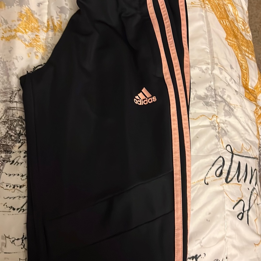 Black and glow pink adidas pants